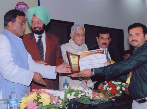 government of india officials giving best ngo award for seruds in delhi, best ngo award for seruds by government of india, seruds received best ngo award from government of india, best charity in ap receives intellectual development award
